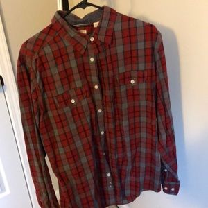 Haggar button up. Fits more like a large.